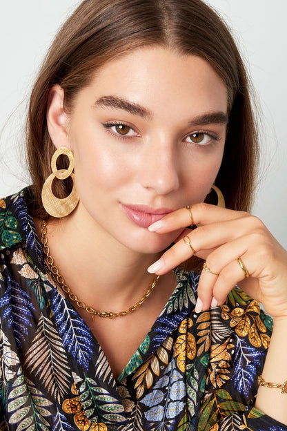 Boucles d’oreilles Doubles Anneaux texturés - acier inoxydable doré